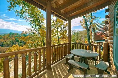 Grand View Lodge Pigeon Forge cabin with covered deck and mountain view