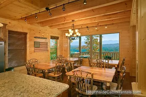 Dining room overlooking the mountains at A View For All Seasons cabin near Gatlinburg