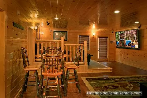 Card game table and home theater system at A View For All Seasons cabin near Gatlinburg
