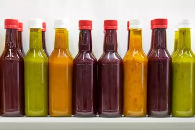 hot sauces lined up in a row