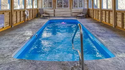 indoor swimming pool of a Hearthside large Smoky Mountain cabin