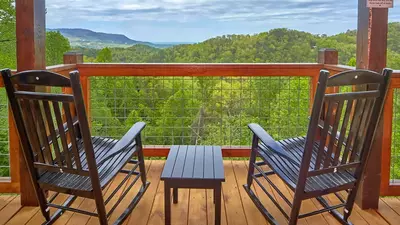 two black rocking chairs overlooking the Smoky Mountains