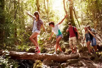 teenagers hiking in the national park