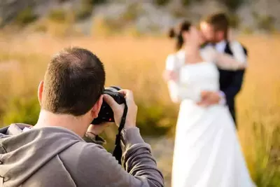photgrapher shooting a wedding in Gatlinburg TN log cabins