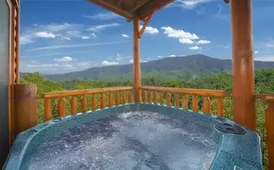 View from the hot tub on the deck of one of our large group cabins in Pigeon Forge TN.