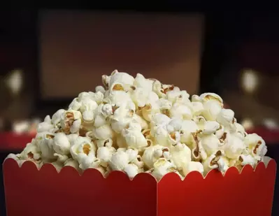 Box of popcorn in a large Pigeon Forge cabin with a theater room