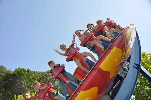 Kid standing on ride at Dollywood