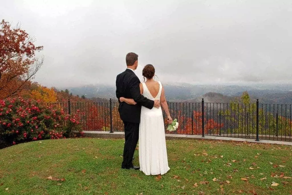 couple looking out at the smoky mountains on their wedding day