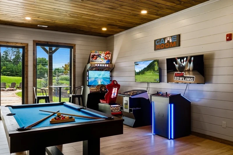 game room at large cabin rental in the smokies