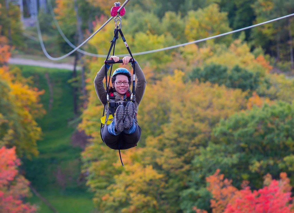 ziplining during fall in the great smoky mountains